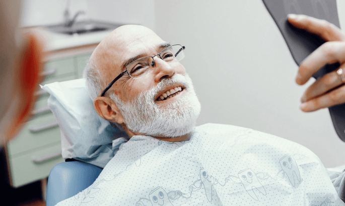 smiling in dental chair